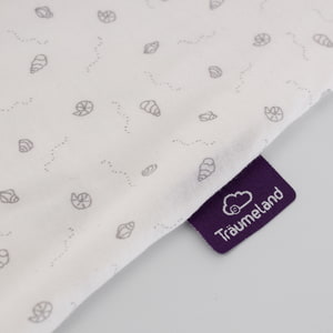 Sommerschlafsack Muscheln aus Baumwolle Detailfoto vom Träumeland-Etikett