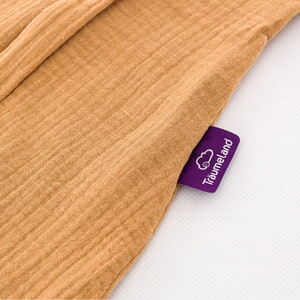 Sommerschlafsack aus Baumwollmusselin in braun Detailfoto vom Träumeland-Etikett